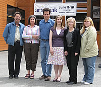 five people in front of civic center