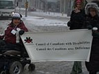 Susan Ralph and colleagues with banner